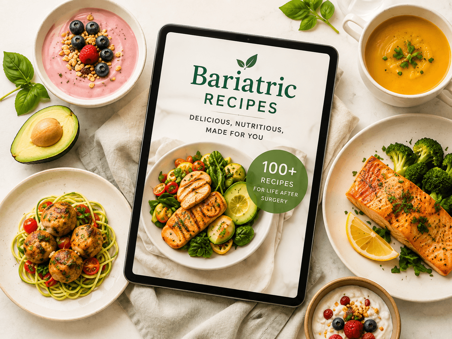 A tablet displaying Bariatric Recipes surrounded by colorful, nourishing meals